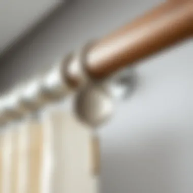 Close-up of curtain rod materials highlighting metal and wood