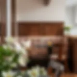 Elegant small kitchen booth with rich wood accents and plush cushions