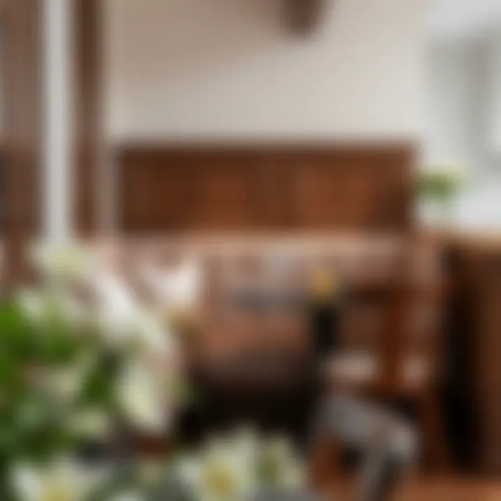 Elegant Wood Accented Booth Seating Elegant small kitchen booth with rich wood accents and plush cushions