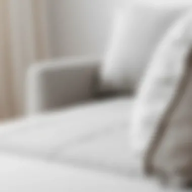 Close-up of fabric texture on a light grey chaise lounge