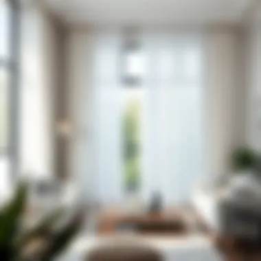 Elegant white blackout curtains with rings hanging in a modern living room