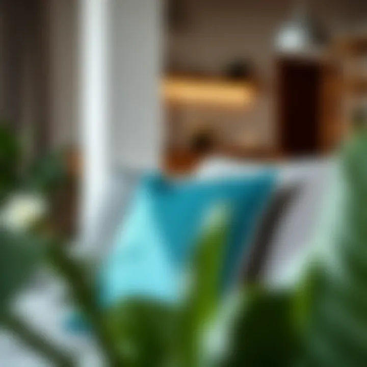 Stylish Teal Pillow in Urban Living Room Stylish teal pillow on a modern gray couch