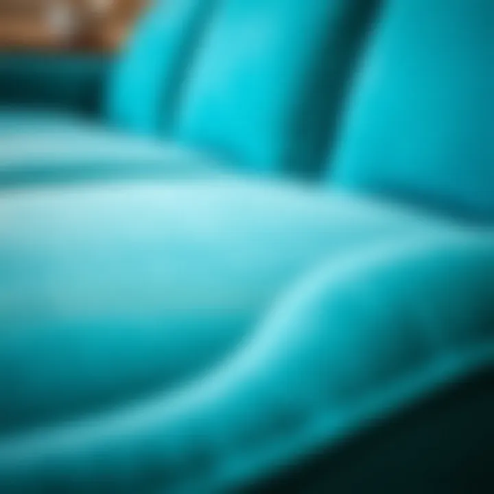 Close-up of a turquoise couch showcasing its texture and fabric