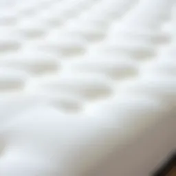 A close-up view of a high-density foam mattress topper showcasing its texture and quality